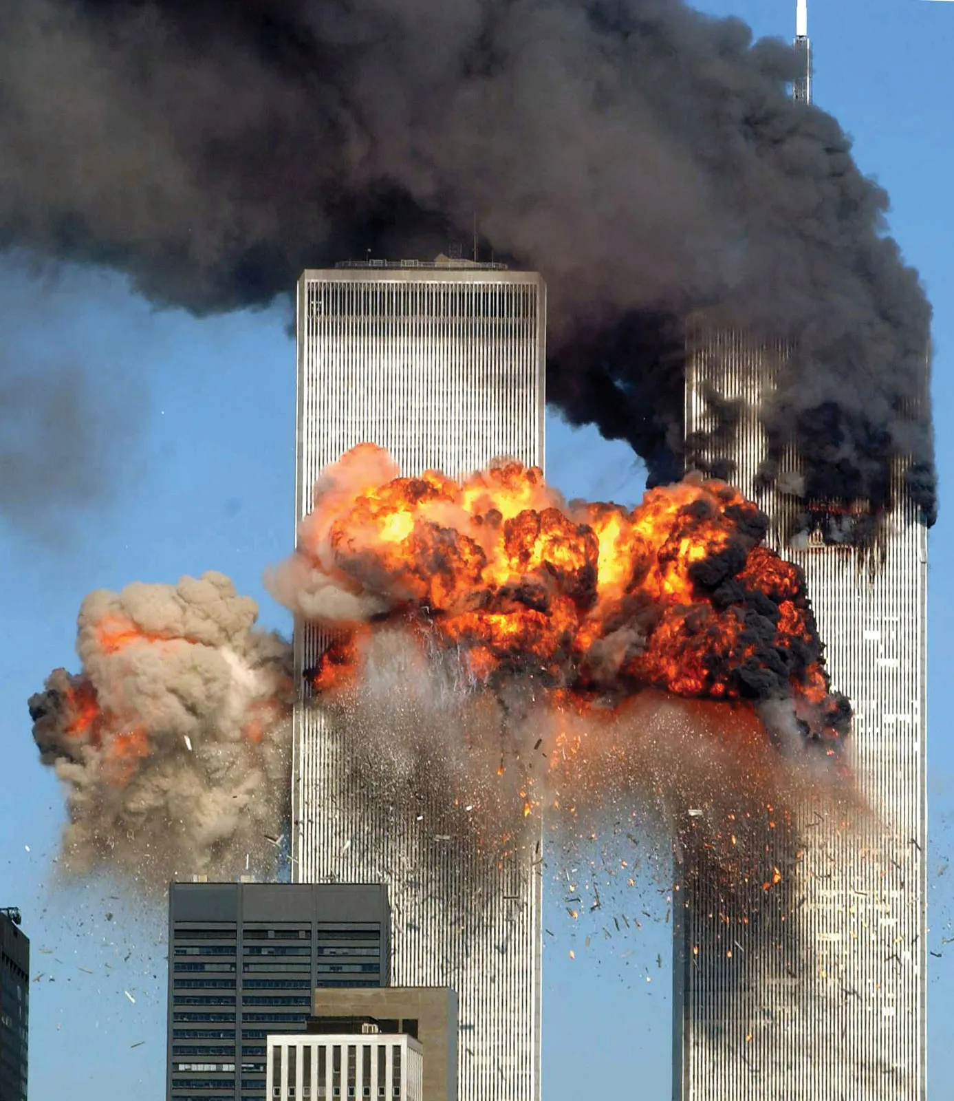 The World Trade Center towers ablaze following the hijacked aircraft impacts, 11 September 2001