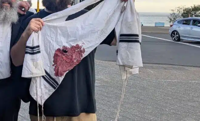 Bloody holy cloth depicting death of the hanukkah shooting victims