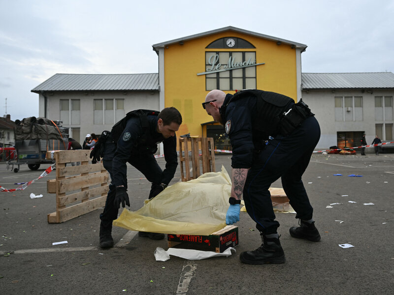 Police secure the area after the attack in Mulhouse.